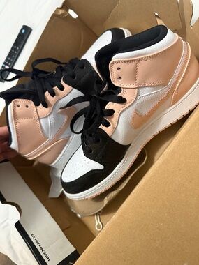 Nike Air Jordan 1 Mid Black, White & Pink Sneakers
